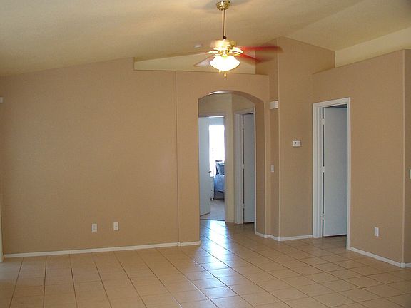 Notice the vaulted ceilings in the living room.