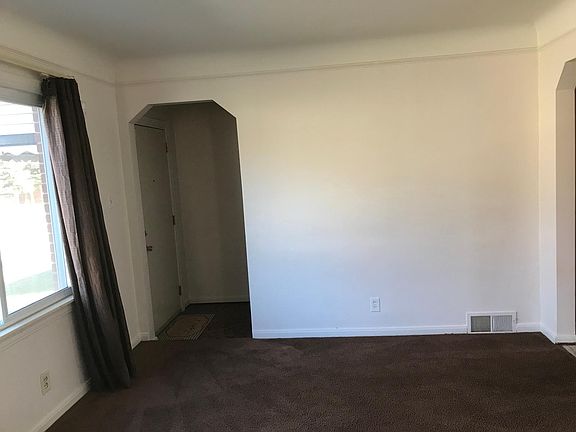 Front entrance , part of living room