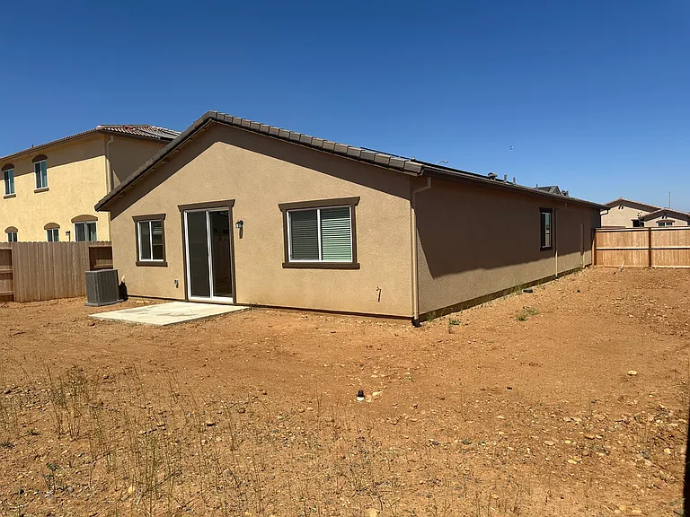 Perfect for families! Large backyard and private sideyard offer room for play, projects, and peaceful enjoyment - Will be paved soon