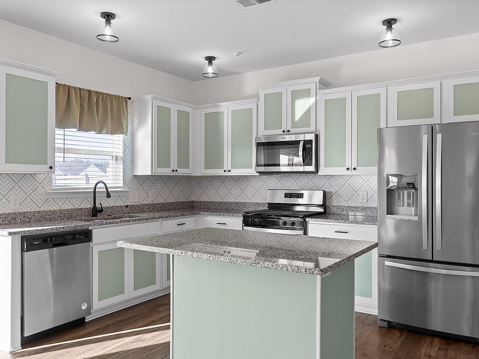 Open concept eat in kitchen.