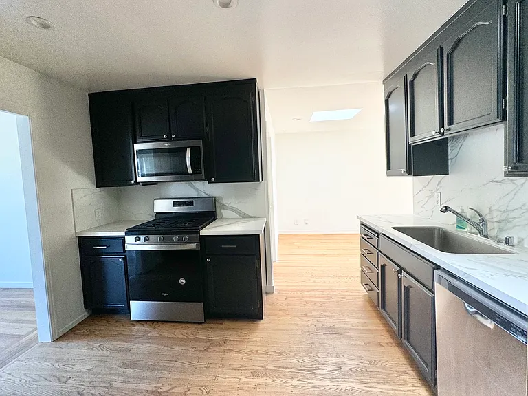 Modern kitchen, connecting to the large family room