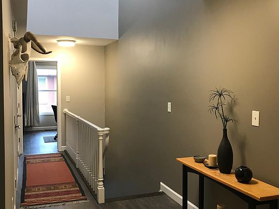 Upper level Hallway with skylight
