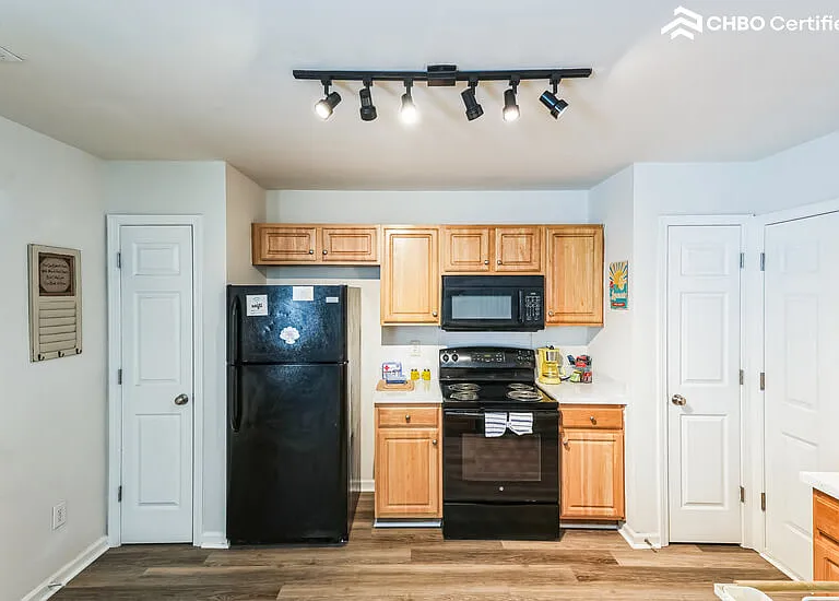 Fridge , stove, microwave and dishwasher.