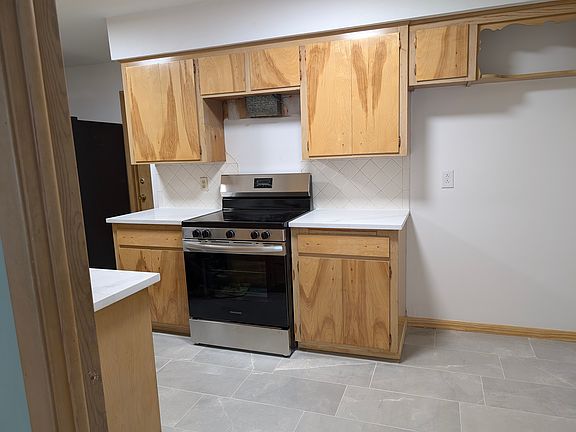 Kitchen with new stove and countertops