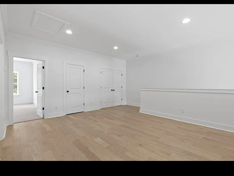 Seating area on upper level, ideal for home theatre.