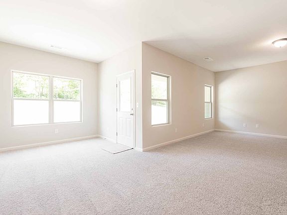 Incredible sun room with plenty of natural light entering through the common areas