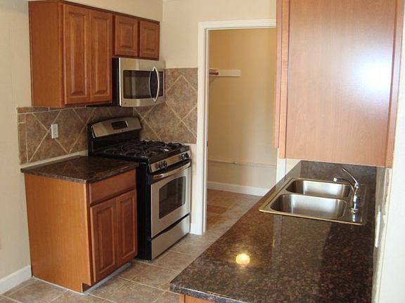 Stainless steel appliances. Gas range. Refrigerator is inclu
