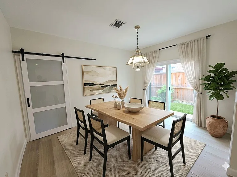 Dining Room with access to the Kitchen, Patio and Living Room