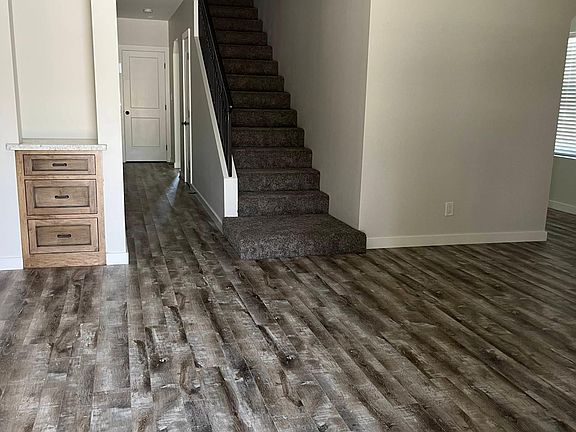 Entry way looking into the house and hallway to bedrooms