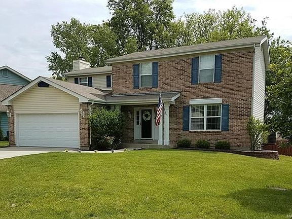Lovely 2 story home, partially finished lower level, and a fenced back yard!