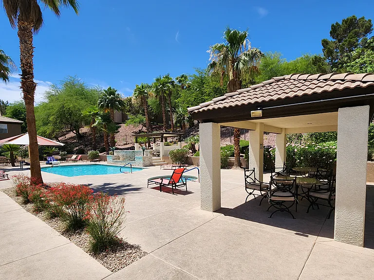 Pool and spa with covered sitting area