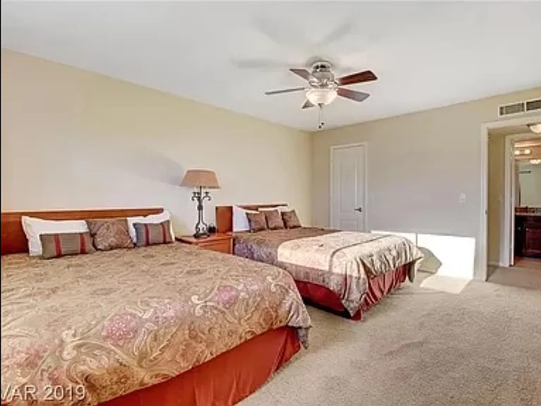 Bedroom has 2 queen beds