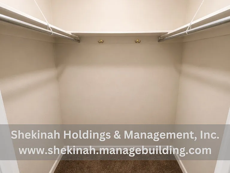 Primary Bedroom Walk-in Closet