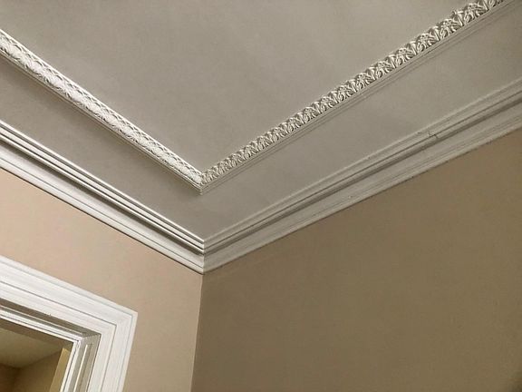 Original ceiling moldings throughout