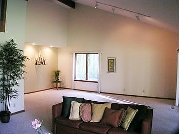 View from the living room showing the dining area beyond.
