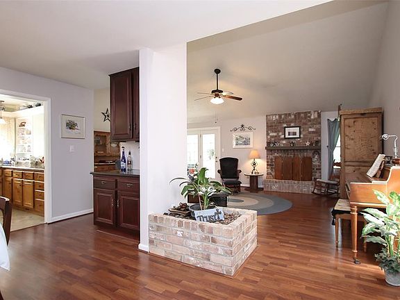 Upon entering you will notice the high ceilings and open concept and all the natural light that fills this home. There is a Butler's pantry or wine bar added between the dining room and family room to make entertaining a breeze.