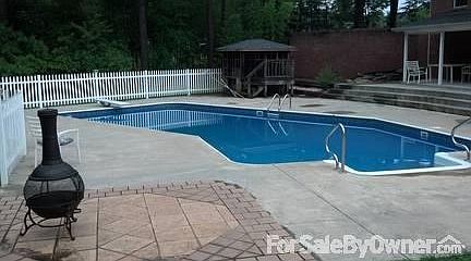 Private back yard patio area
						:
						Bamboo woods, 8' deep pool, diving board, Jacuzzi hut, patio awning & coy pond.
