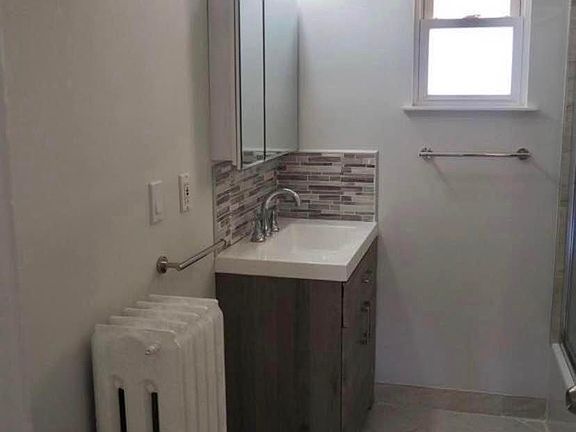 renovated bath with tub
