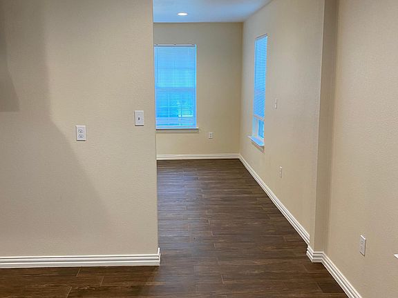 Kitchen looking into livingroom. Space for kitchen table