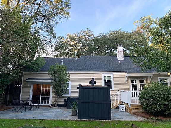 Large privacy fence with outdoor shower