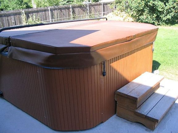 Hot tub on concrete patio 