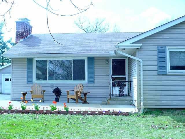 Exterior Front: Warm Inviting Home With Geat Curb Appeal And Location 