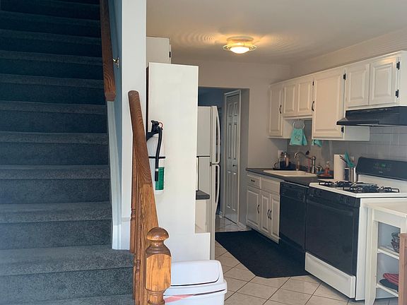 kitchen on first floor, stairs to bedrooms