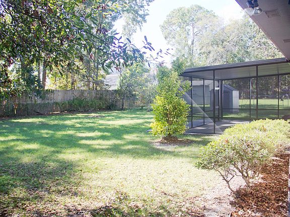 back yard with screened porch