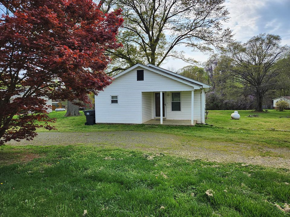 Exterior front of house. Lots of room to walk pets.
