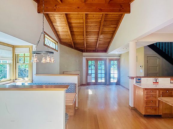 Breakfast nook to the left and large, beautiful kitchen to the right, easy to enjoy meals, game nights and homework/work area new the heart of the home