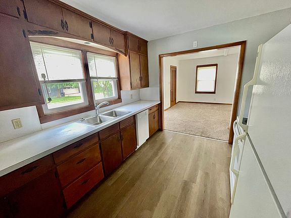 Spacious kitchen with plenty of countertop space & cupboards.