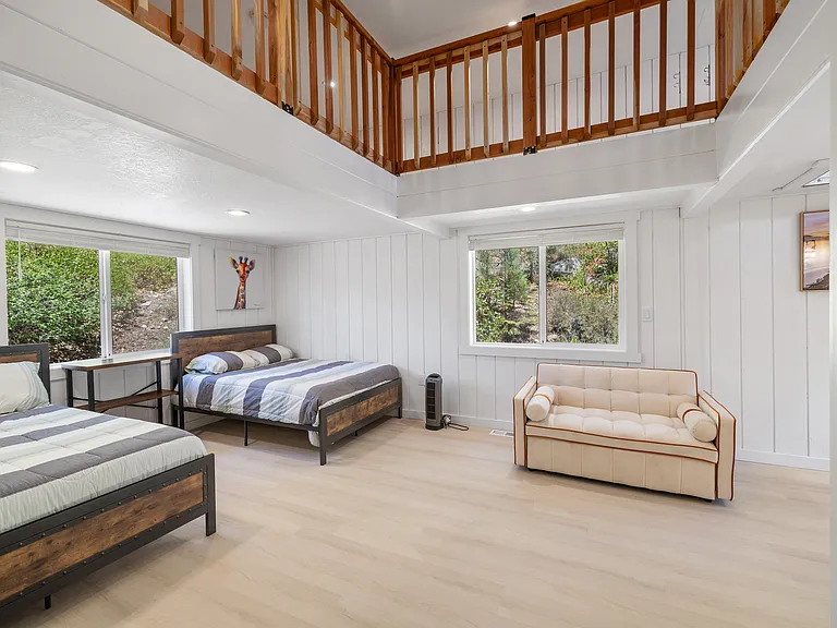 Third bedroom off Second can be closed off by sliding glass door. Additional sleeping loft is above