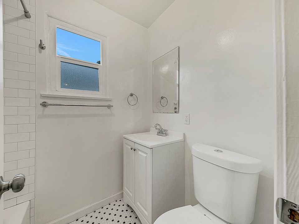 Bathroom with tub and shower combination