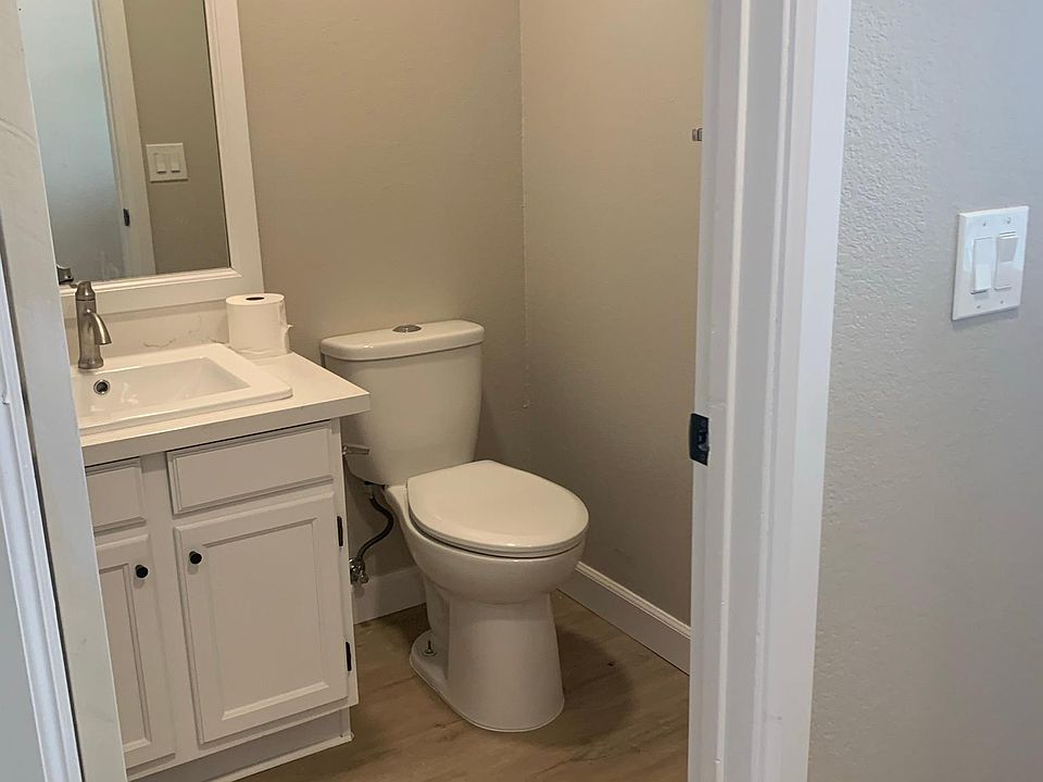 Half bath downstairs next to living room.