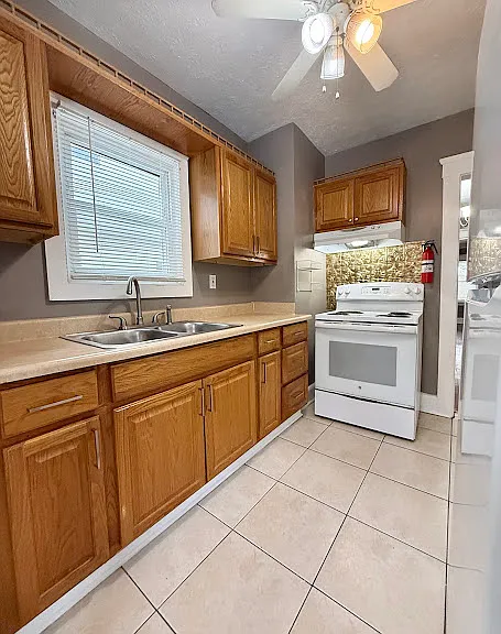 1427 W 54th St #DOWN — Photo 25