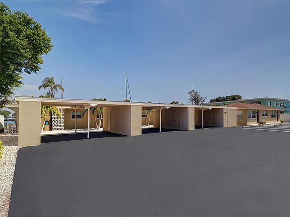 Unit 6 includes the carport on the far right (#6)
