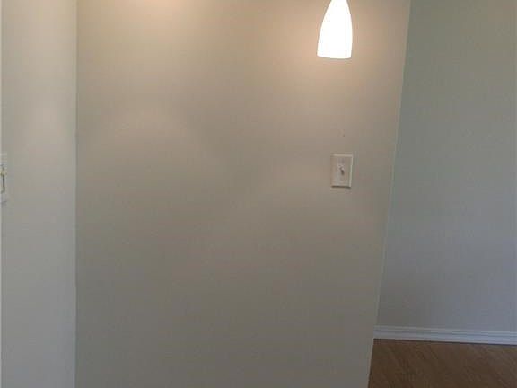 This area  between the kitchen and dining area would make a great place for a coffee or beverage bar.