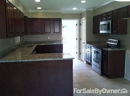 Eat in kitchen : New cabinets, granite countertops, & stainless steel appliances