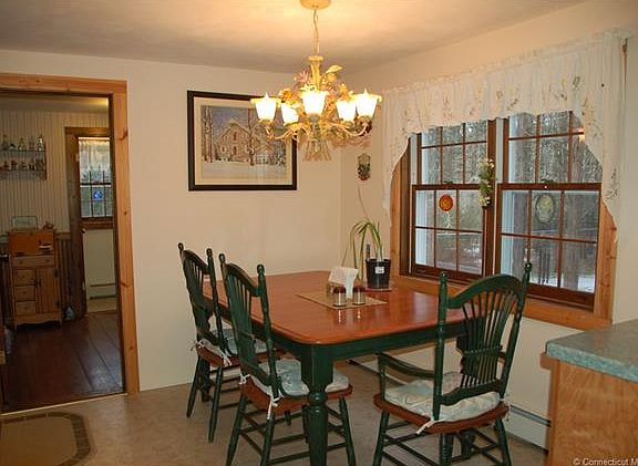 Dining area with view to ba...