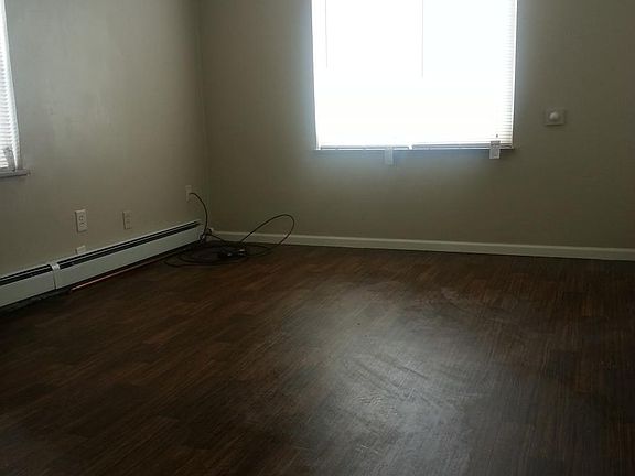 Main room with new floor and windows