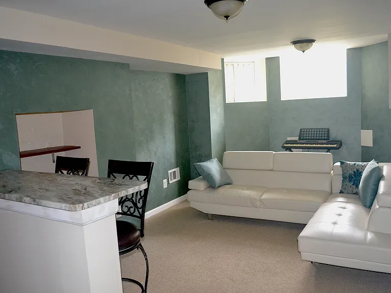 Living room facing front of building