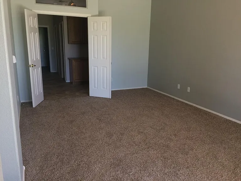 This is the master bedroom, as viewed from the patio door.