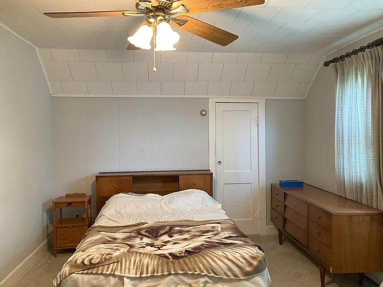bedroom 1 in front of home. Bed and furniture included + large closet and smaller closet