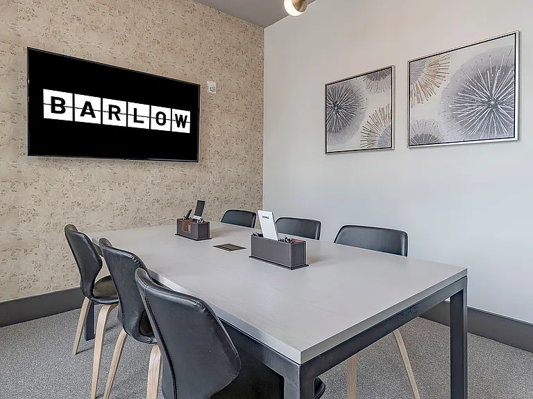 Step into this contemporary meeting space designed for productivity and style.