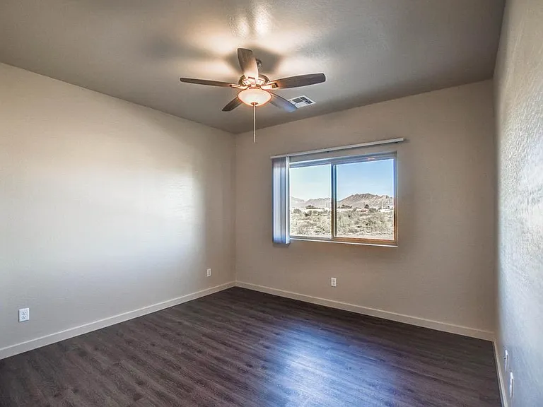 View into larger bedroom