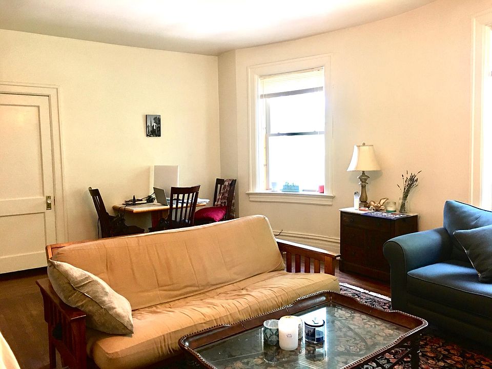 Plenty of space for comfortable couches and chairs in this large Living Room!