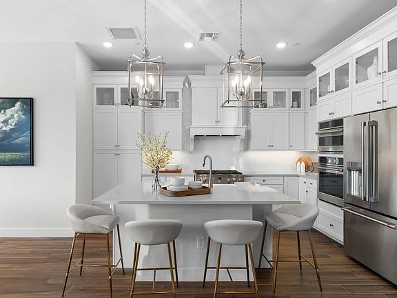 Kitchen with pendant lighting over island