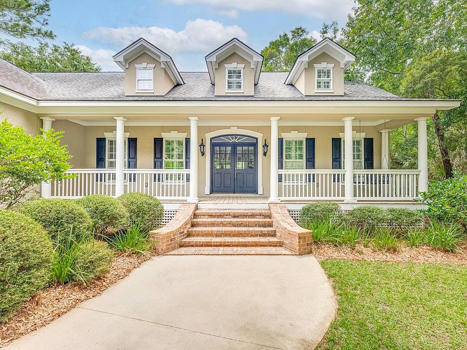 Wide front porch with porch swing