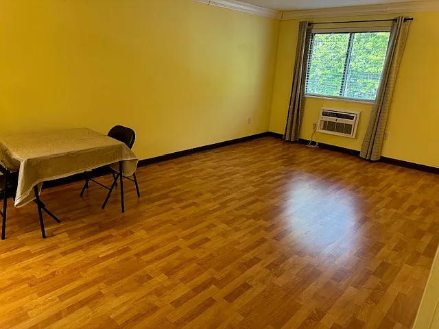 Living area large enough for a table and chairs plus your living room furniture
