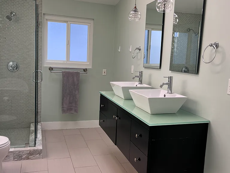 Upstairs bathroom with shower and bath tub
